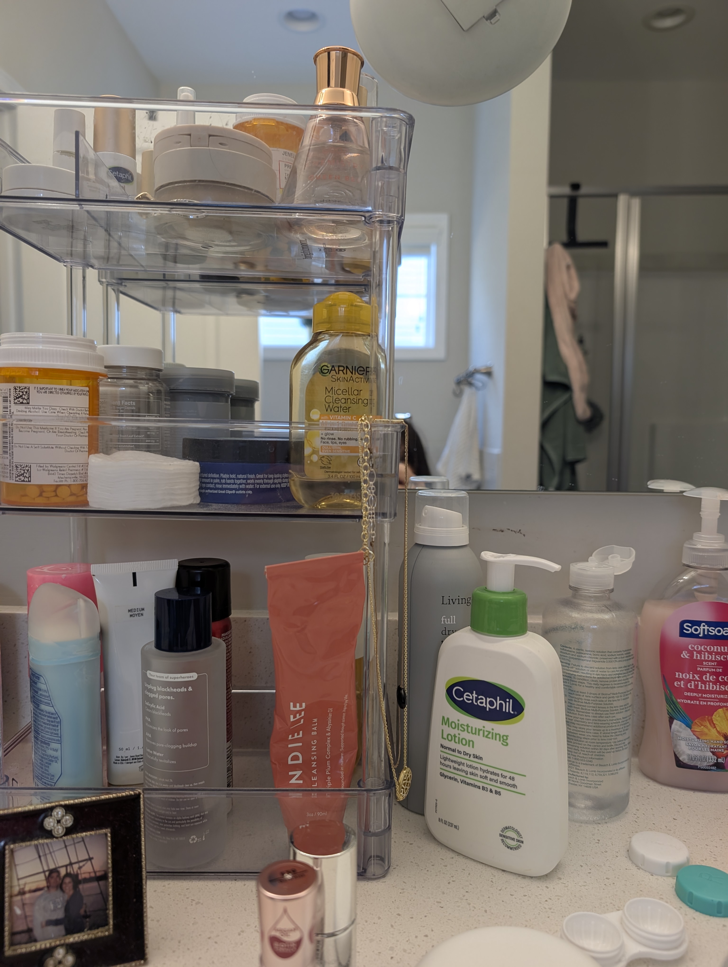 bathroom sink full of products